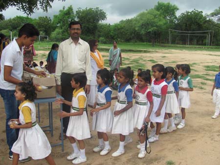 Sweet distribution to childrens