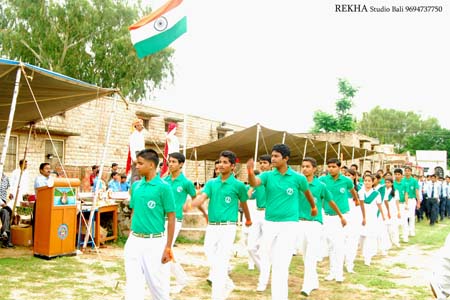 The students of Fabindia participating in a the Parade at Govt. High School