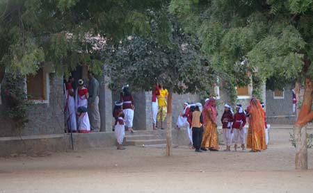 School students waiting for program to start