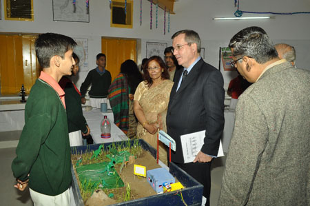 Chief Guest asking questions in the Science Exhibition