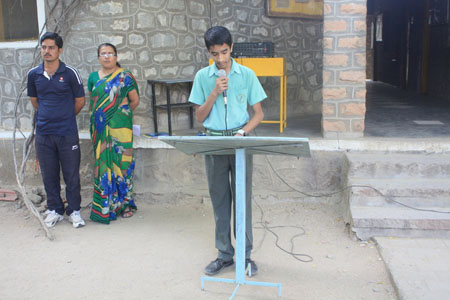 Dhaval Jain delivering a speech 