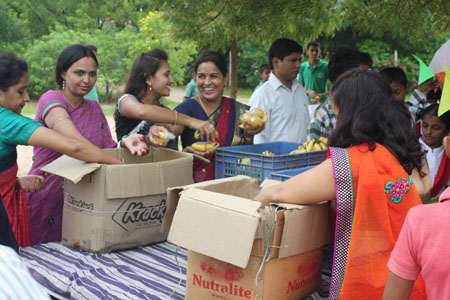 Distribution of Sweets & fruit