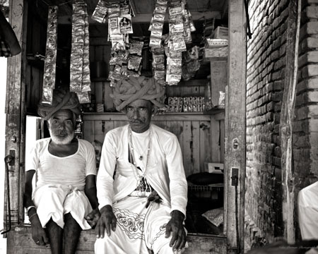 SOLD-Striking a pose in their paan shop