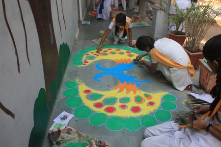 Teresa House Girls Making Rangoli